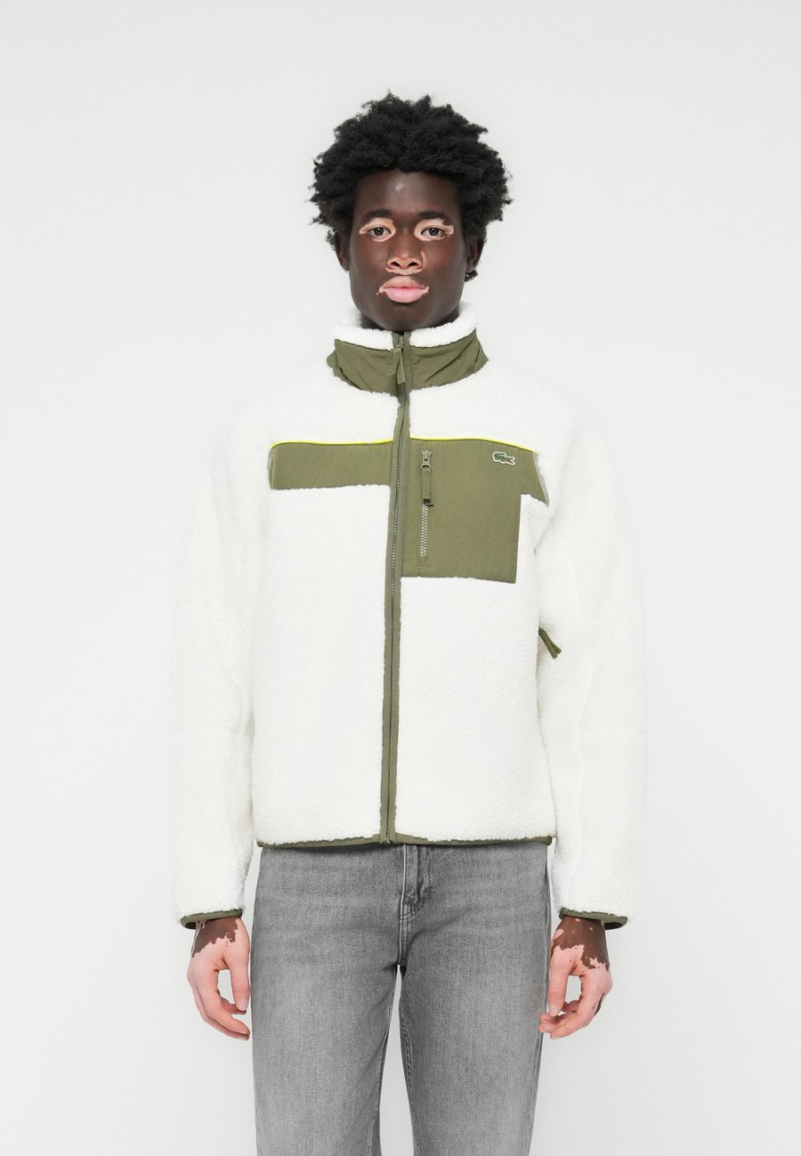 Флисовая куртка Lacoste Fleece jacket, Flour/Olive/Off-White
Флисовая куртка Lacoste Fleece jacket, Flour/Olive/Off-White