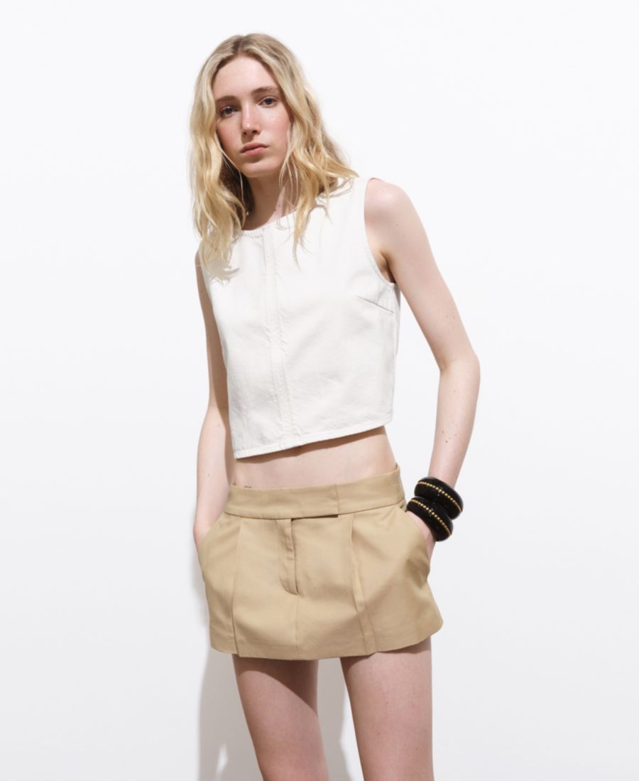 Женский джинсовый укороченный топ с застежкой-пряжкой MANGO, Off White
Женский джинсовый укороченный топ с застежкой-пряжкой MANGO, Off White