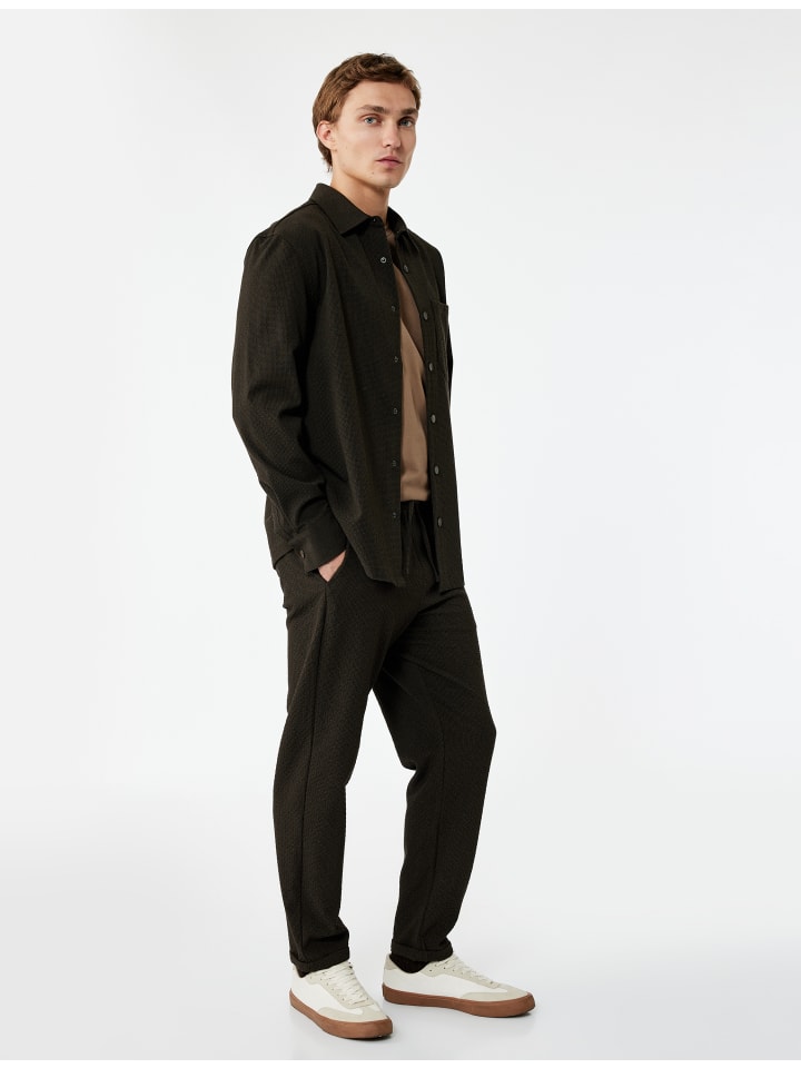 Брюки коричневого цвета KOTON
Брюки коричневого цвета KOTON