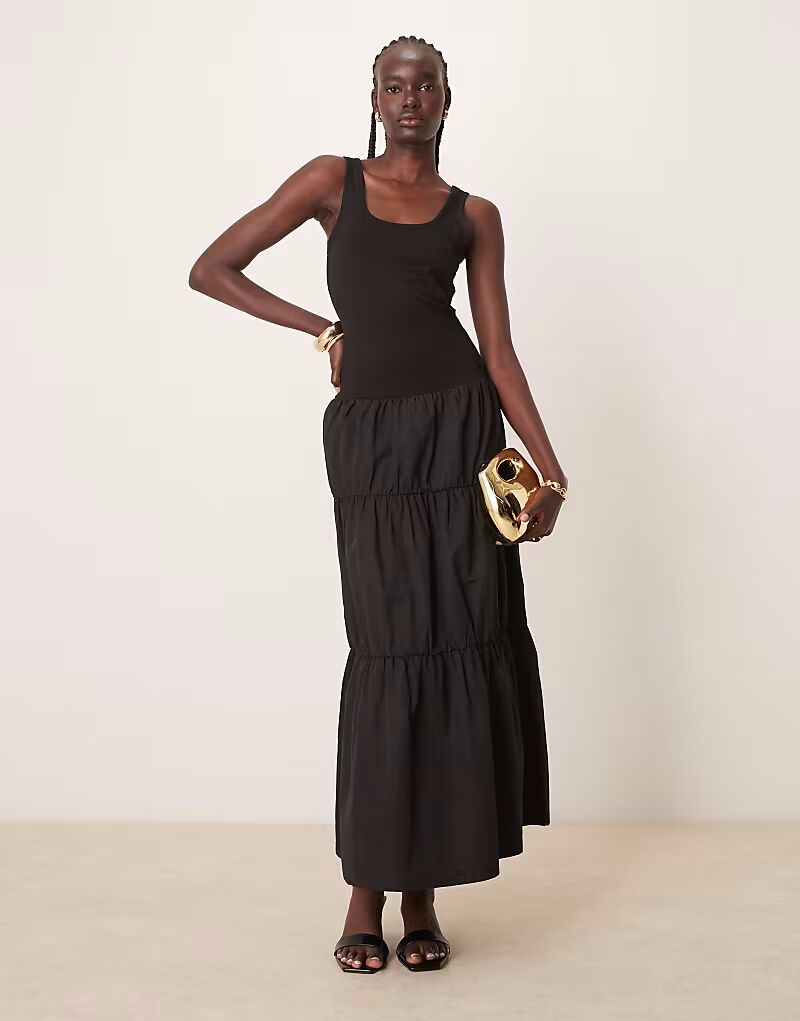 Платье макси ASOS DESIGN многоярусное с юбкой из поплина черного цвета
Платье макси ASOS DESIGN многоярусное с юбкой из поплина черного цвета