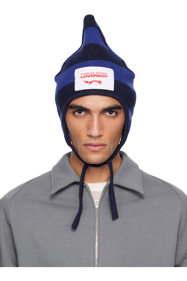 Charles Jeffrey Loverboy Шапка-Бини с синими шипами
Charles Jeffrey Loverboy Шапка-Бини с синими шипами