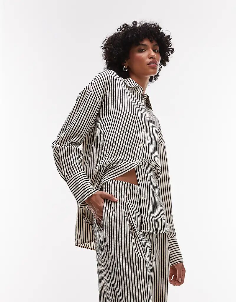 Рубашка свободного кроя Mango в однотонную полоску
Рубашка свободного кроя Mango в однотонную полоску