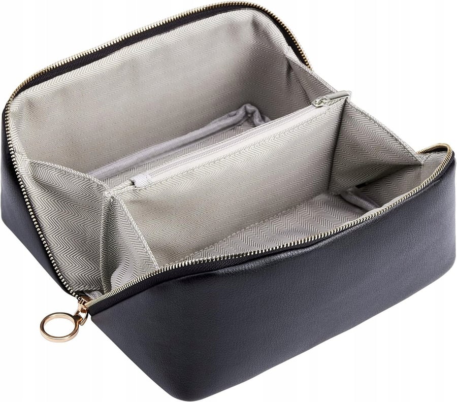 Черная косметичка из искусственной кожи Inna marka
Черная косметичка из искусственной кожи Inna marka