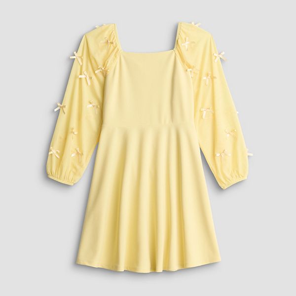 Платье для девочек 7-16 лет с прозрачными рукавами и отделкой бантом Speechless, Butter
Платье для девочек 7-16 лет с прозрачными рукавами и отделкой бантом Speechless, Butter