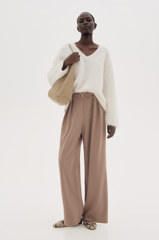 Элегантные брюки с декоративной уздечкой H&M, бежевый
Элегантные брюки с декоративной уздечкой H&M, бежевый