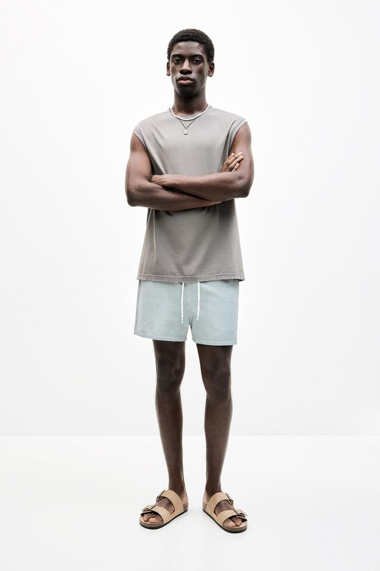 Плавки полосатые из ткани сирсакер Pull And Bear, зеленый
Плавки полосатые из ткани сирсакер Pull And Bear, зеленый