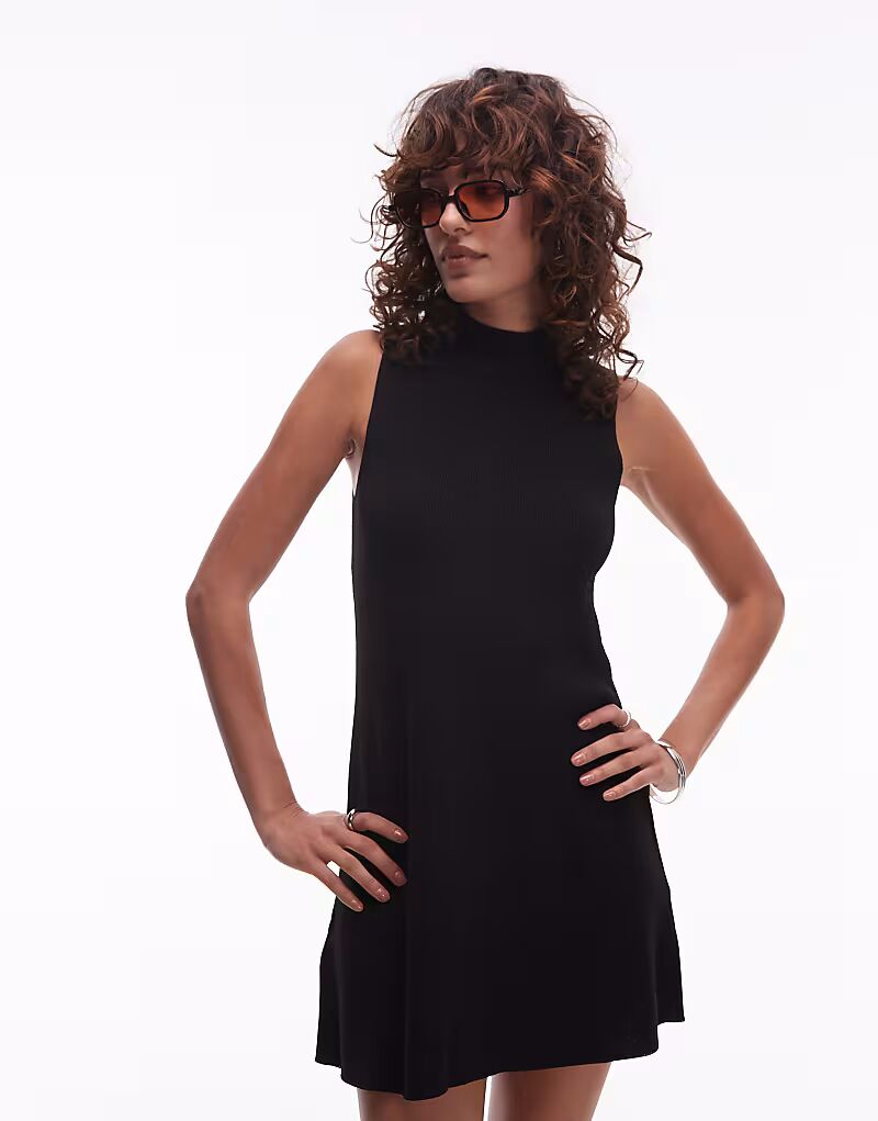 Мини-платье Mango плотного трикотажа черного цвета
Мини-платье Mango плотного трикотажа черного цвета
