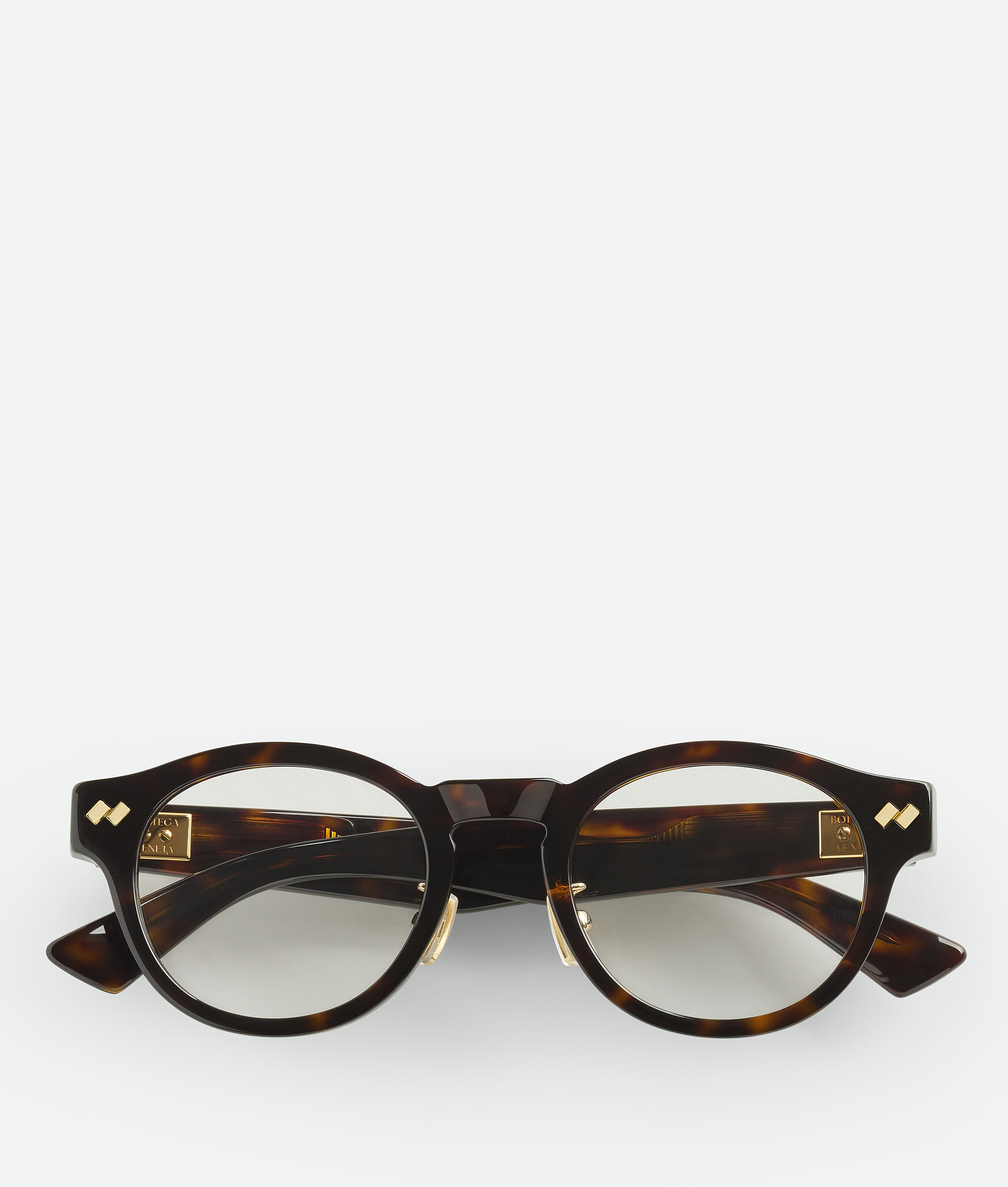 Dizzy round eyeglasses BOTTEGA VENETA, гавана/прозрачный
Dizzy round eyeglasses BOTTEGA VENETA, гавана/прозрачный