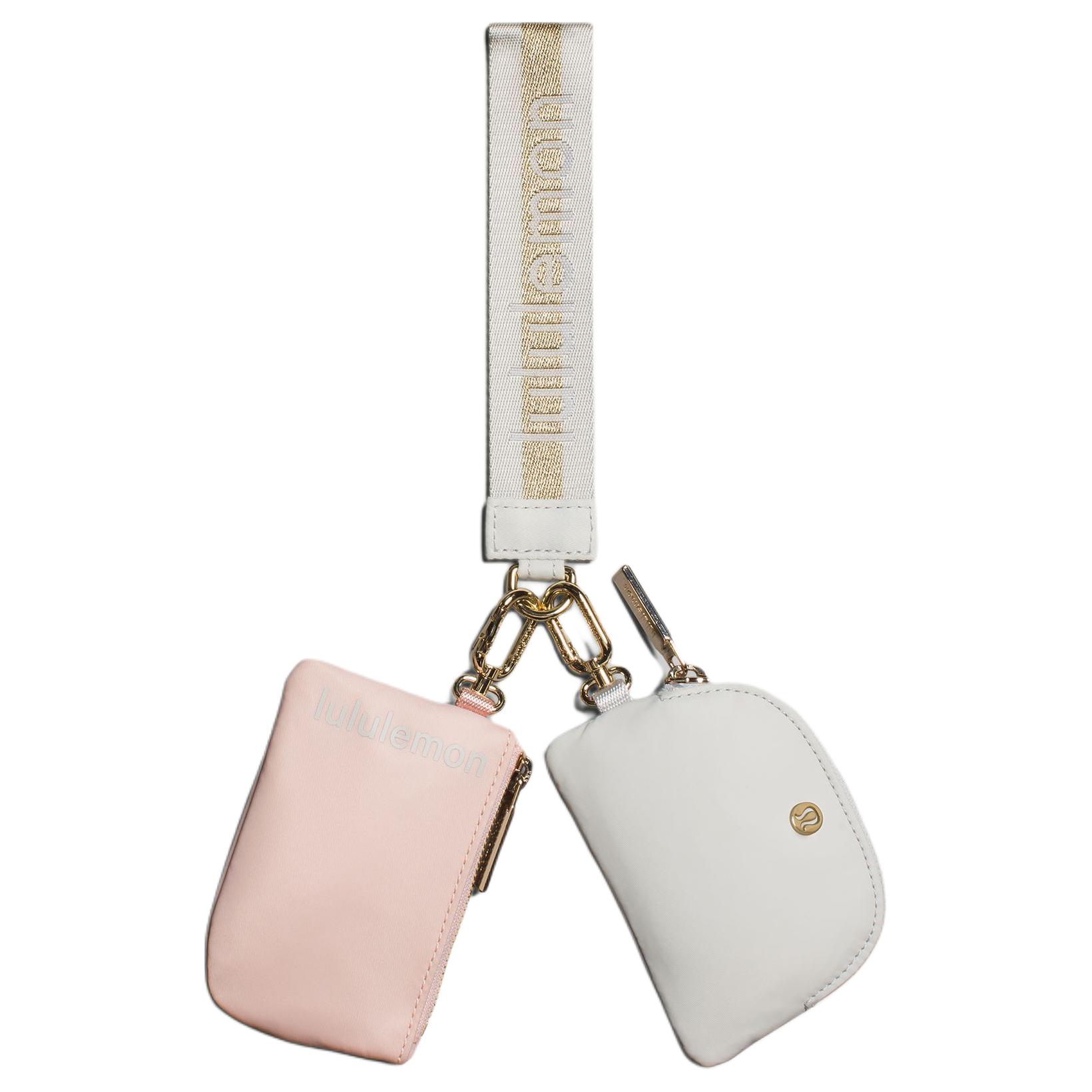Lululemon Переработанный нейлоновый кошелёк на запястье женский золотисто-белый, Gold & White 
Lululemon Переработанный нейлоновый кошелёк на запястье женский золотисто-белый, Gold & White