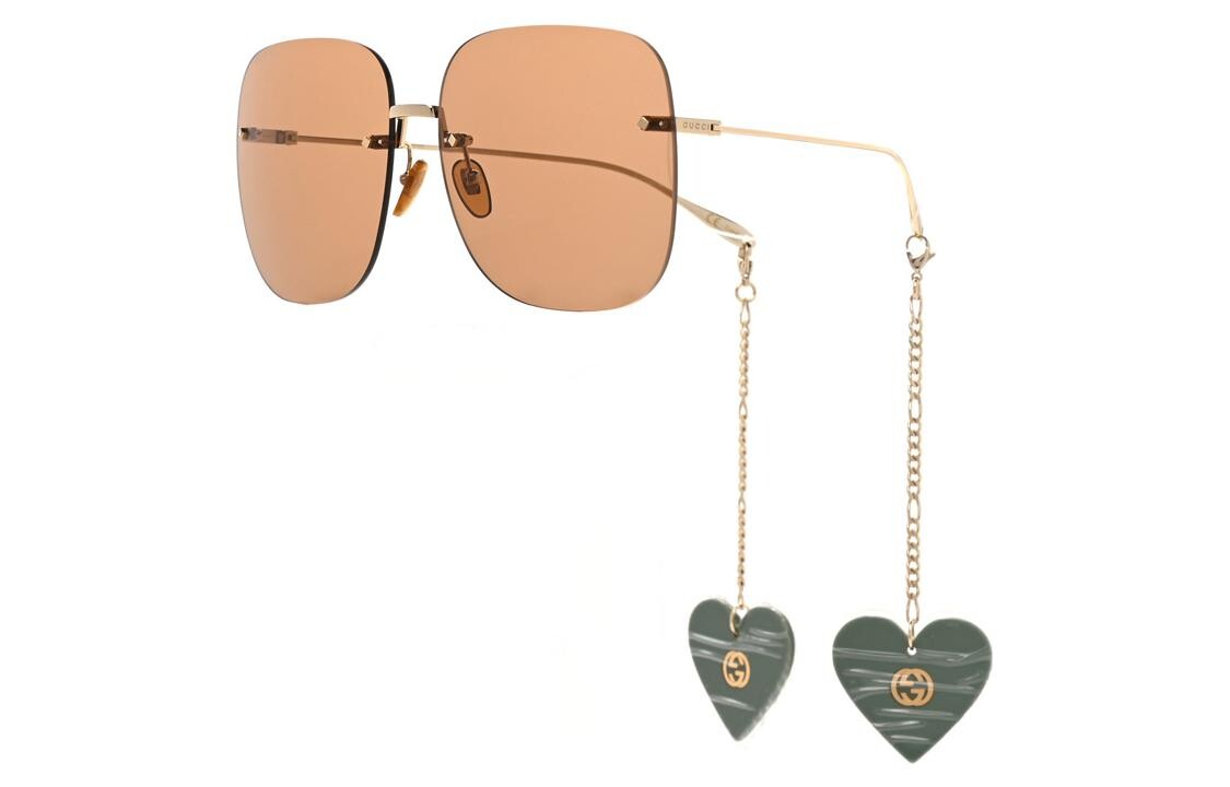Очки солнцезащитные женские Gucci с подвесками в виде сердечек, золотой
Очки солнцезащитные женские Gucci с подвесками в виде сердечек, золотой