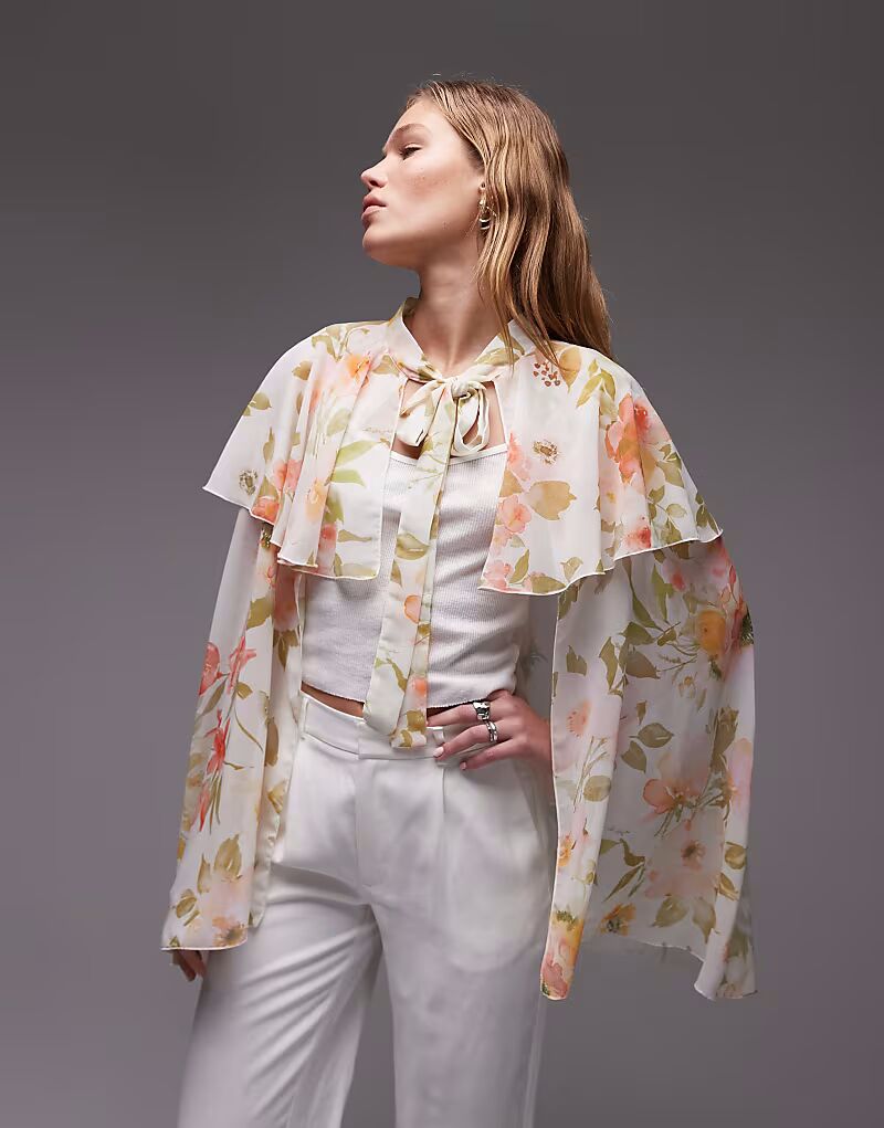 Шифоновый топ-накидка с оборками и завязкой спереди ASOS DESIGN с крупным цветочным принтом
Шифоновый топ-накидка с оборками и завязкой спереди ASOS DESIGN с крупным цветочным принтом