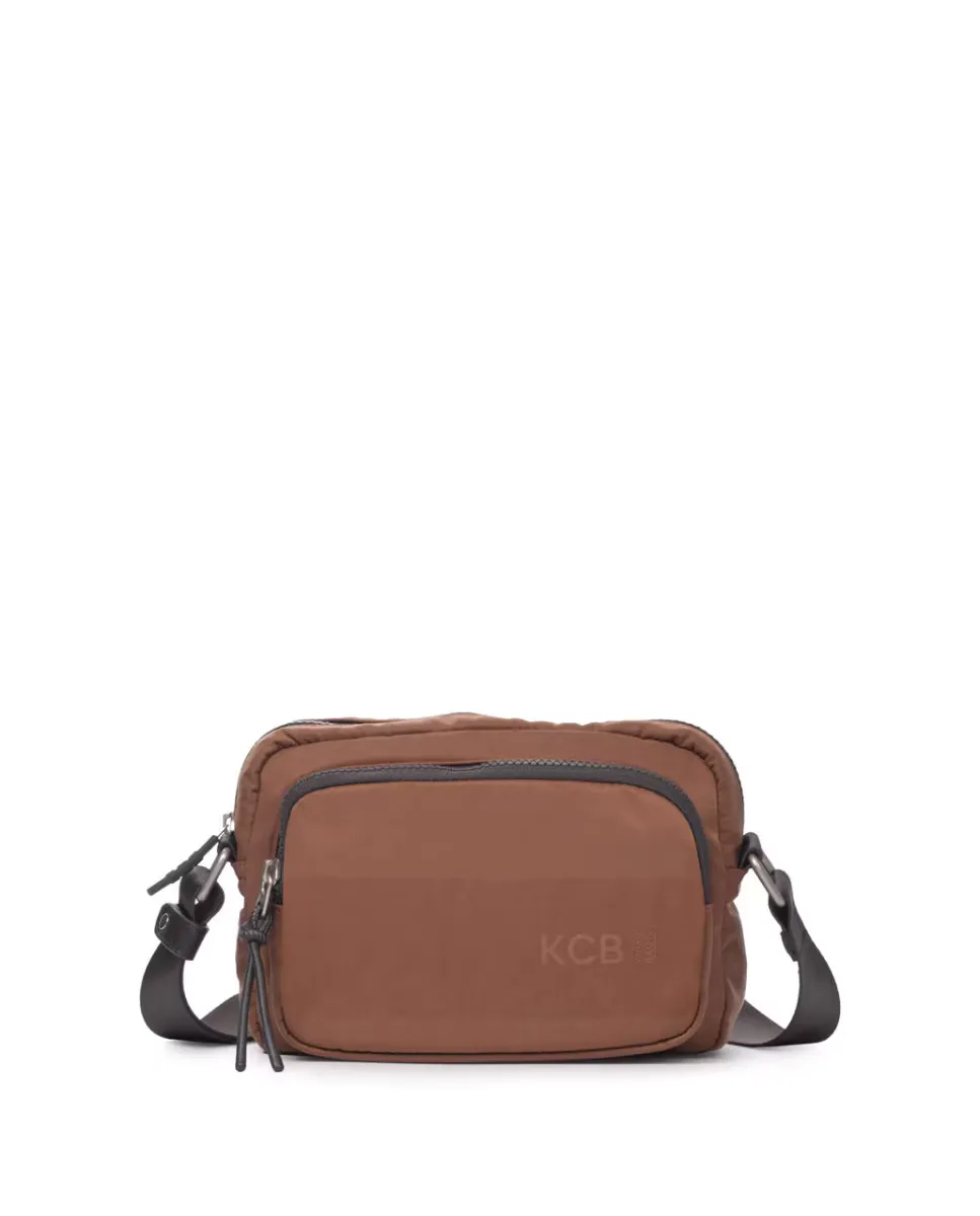 Маленькая широкая женская сумка через плечо коричневого цвета Kcb
Маленькая широкая женская сумка через плечо коричневого цвета Kcb
