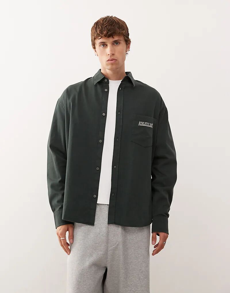 Рубашка свободного кроя с длинными рукавами и вышитым текстом темно-зеленого цвета для будних дней
Рубашка свободного кроя с длинными рукавами и вышитым текстом темно-зеленого цвета для будних дней