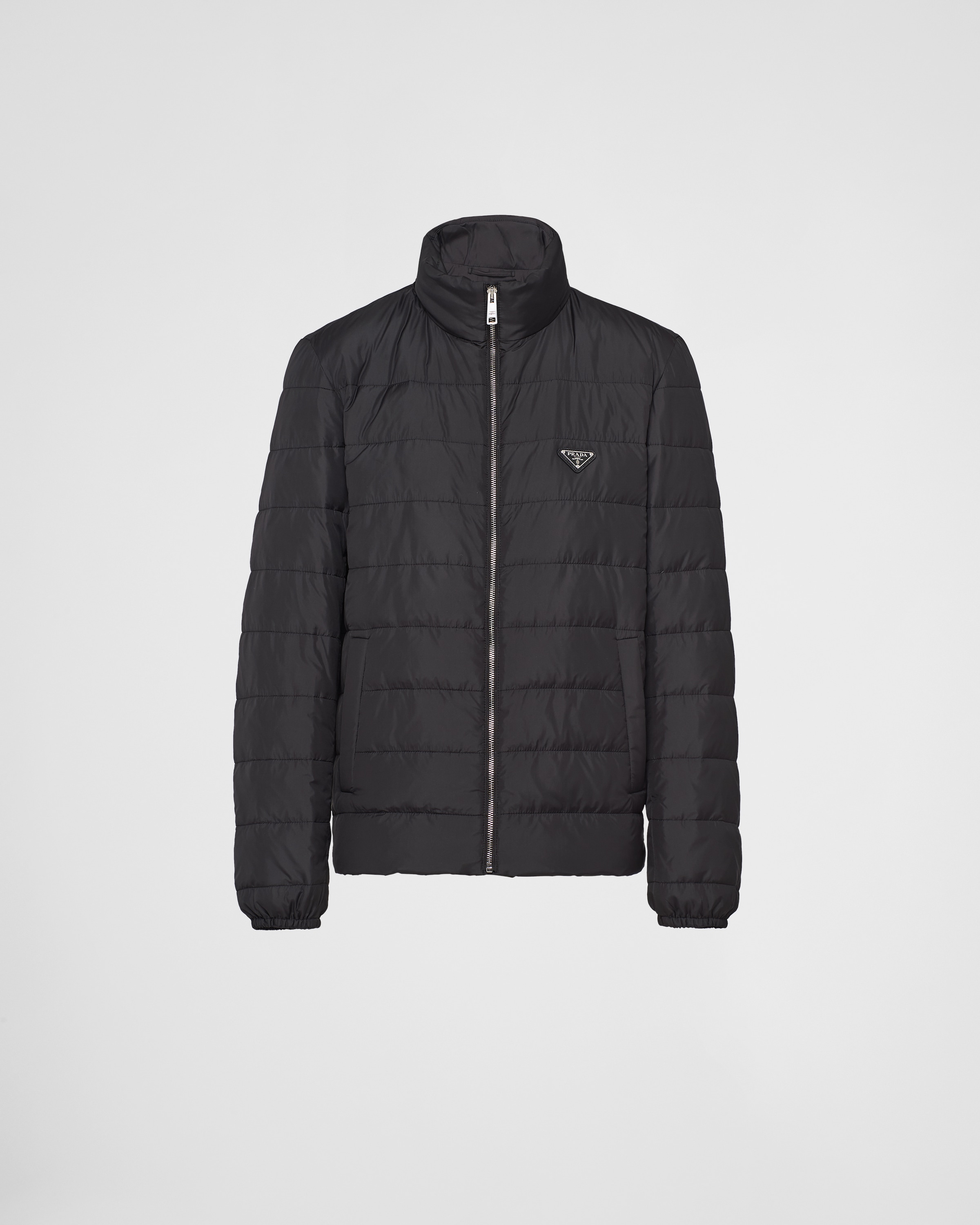 Пуховик из полиэстера среднего веса Prada, черный
Пуховик из полиэстера среднего веса Prada, черный