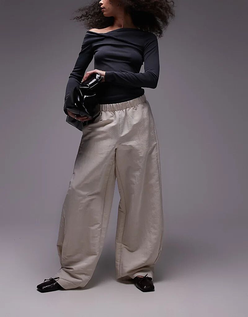 Брюки из атласа с резинкой на талии кремового цвета Mango
Брюки из атласа с резинкой на талии кремового цвета Mango