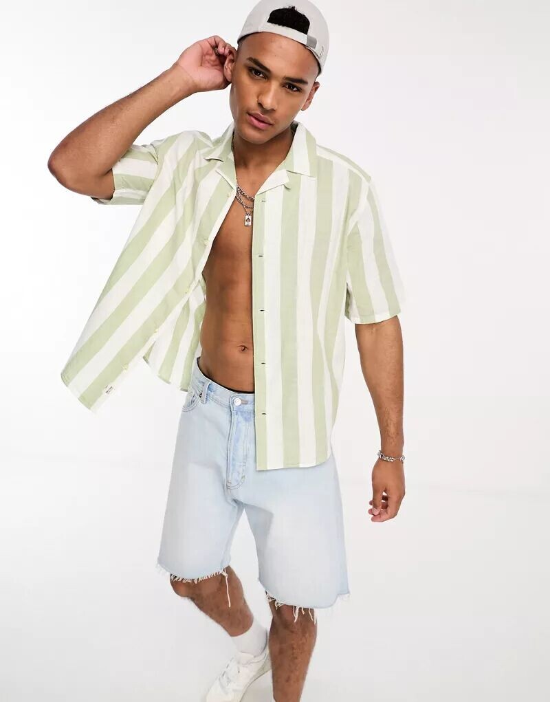 Зеленая полосатая рубашка оверсайз с воротником с лацканами Only & Sons
Зеленая полосатая рубашка оверсайз с воротником с лацканами Only & Sons