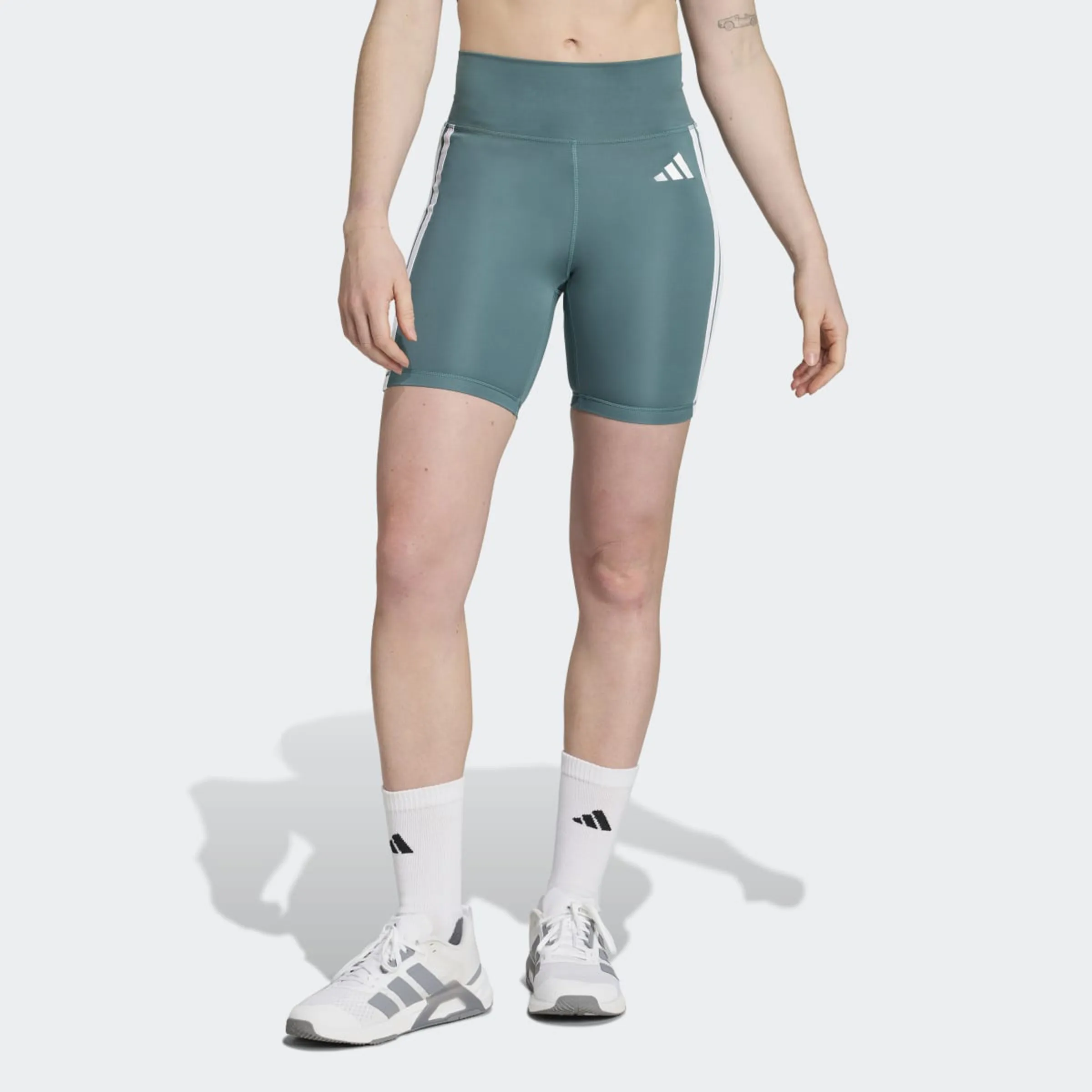 Женские короткие шорты Optime Essentials 3 полоски Adidas, зеленый
Женские короткие шорты Optime Essentials 3 полоски Adidas, зеленый
