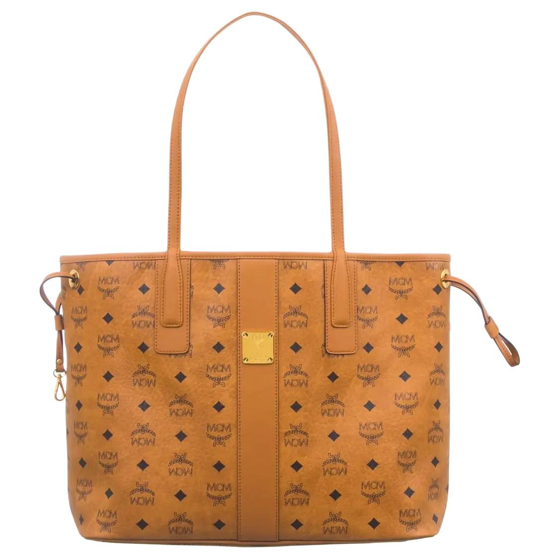 Реверсивная сумка-шоппер Liz Medium Visetos коньяк MCM
Реверсивная сумка-шоппер Liz Medium Visetos коньяк MCM