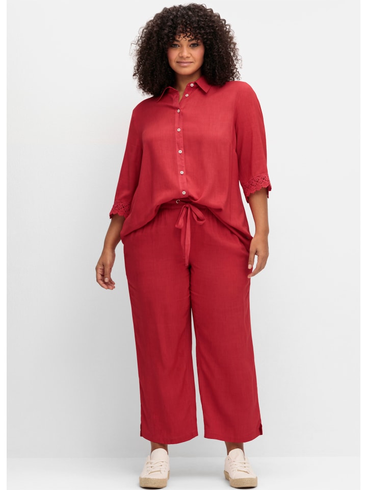 Блузка-рубашка клубничного цвета sheego
Блузка-рубашка клубничного цвета sheego