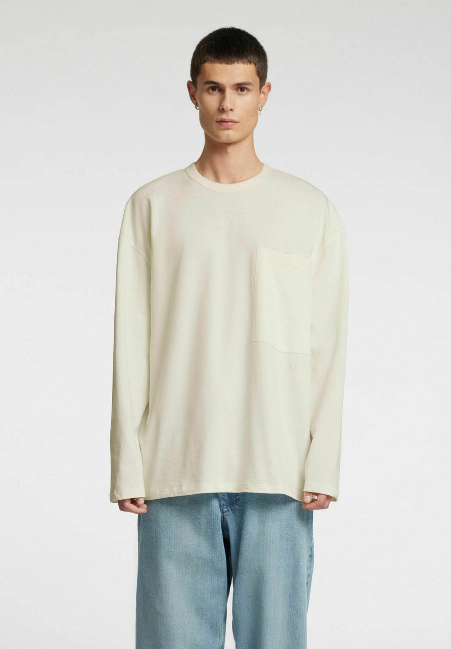 Топ Annarr Long sleeved top, Coconut Milk/Off-White
Топ Annarr Long sleeved top, Coconut Milk/Off-White