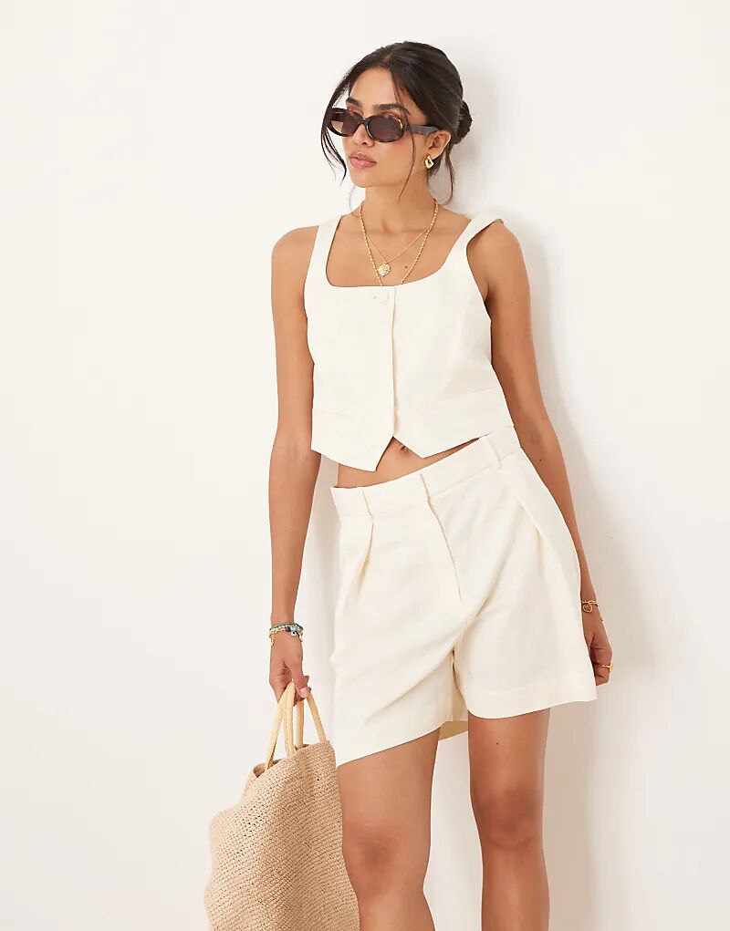 Укороченный жилет из смеси хлопка Mango белого цвета с низким квадратным вырезом
Укороченный жилет из смеси хлопка Mango белого цвета с низким квадратным вырезом