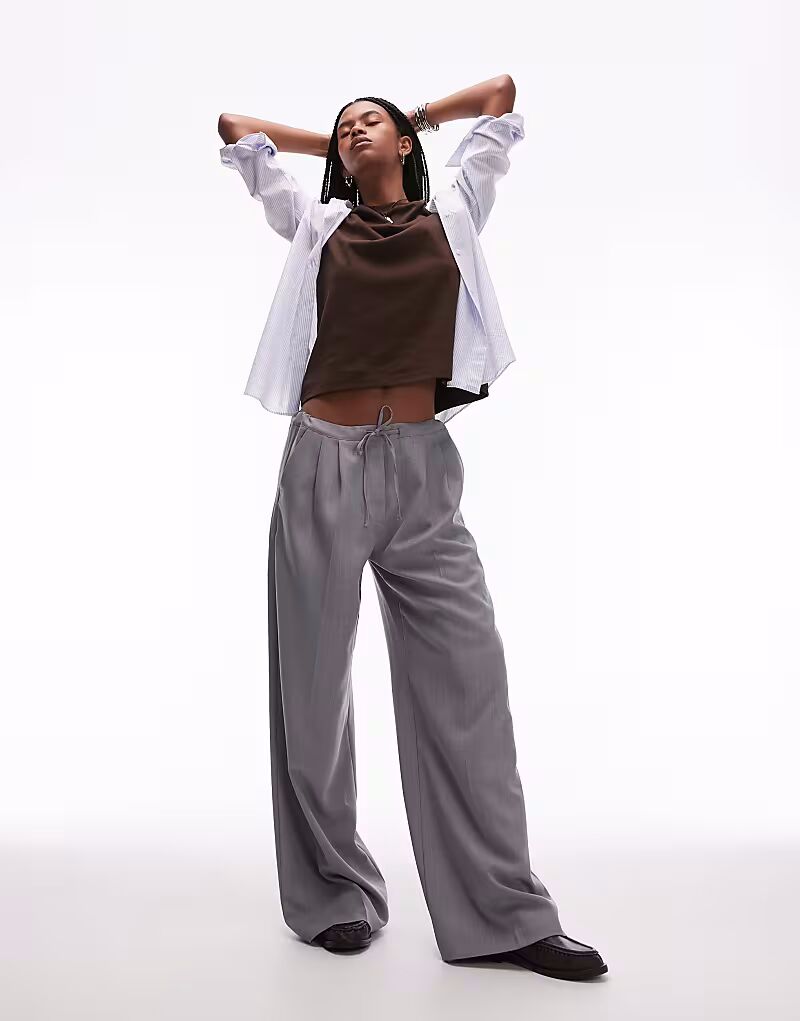 Спортивные брюки Topshop с завязками на талии светло-серого цвета
Спортивные брюки Topshop с завязками на талии светло-серого цвета