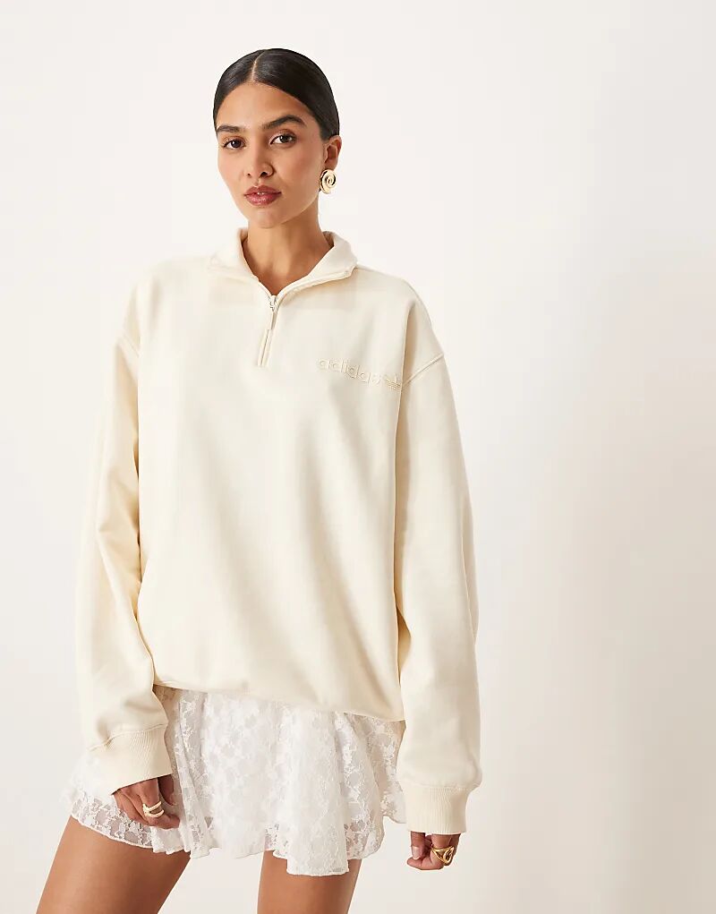 Толстовка с линейным логотипом adidas Originals кремового цвета с полумолнией
Толстовка с линейным логотипом adidas Originals кремового цвета с полумолнией