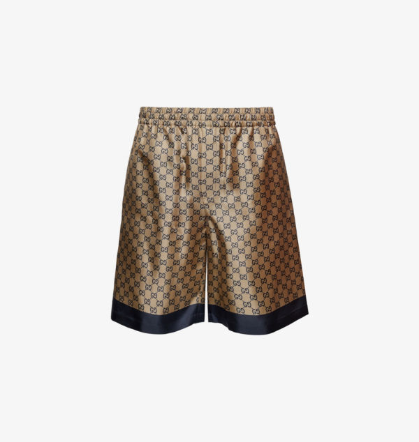 Свободные шелковые шорты с принтом монограммы и двумя накладными карманами Gucci, синий
Свободные шелковые шорты с принтом монограммы и двумя накладными карманами Gucci, синий
