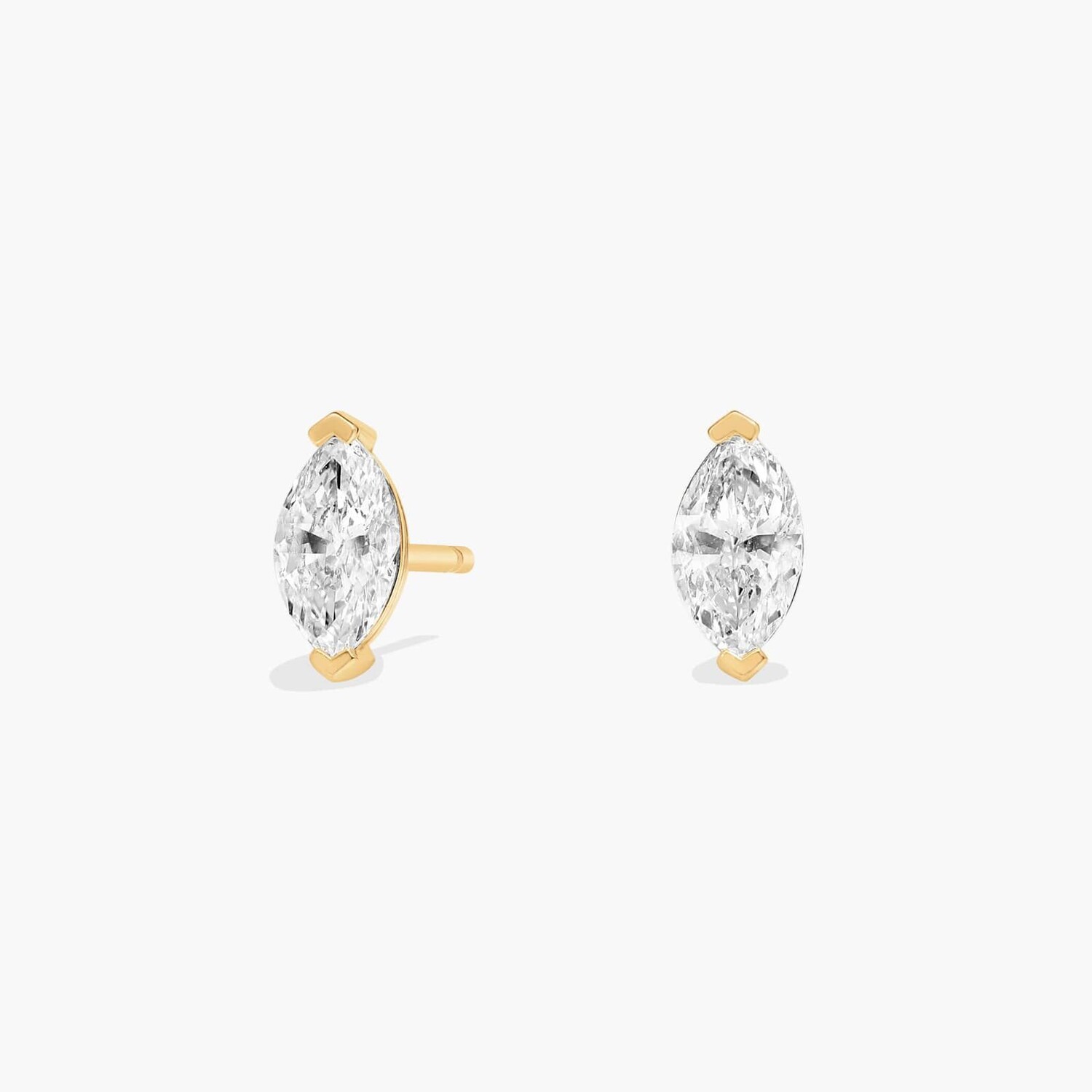 Серьги-гвоздики с выращенными в лаборатории бриллиантами огранки «маркиза» из желтого золота 14 карат (1/2 карата, два цвета — FG / VS2-SI1) Blue Nile
Серьги-гвоздики с выращенными в лаборатории бриллиантами огранки «маркиза» из желтого золота 14 карат (1/2 карата, два цвета — FG / VS2-SI1) Blue Nile