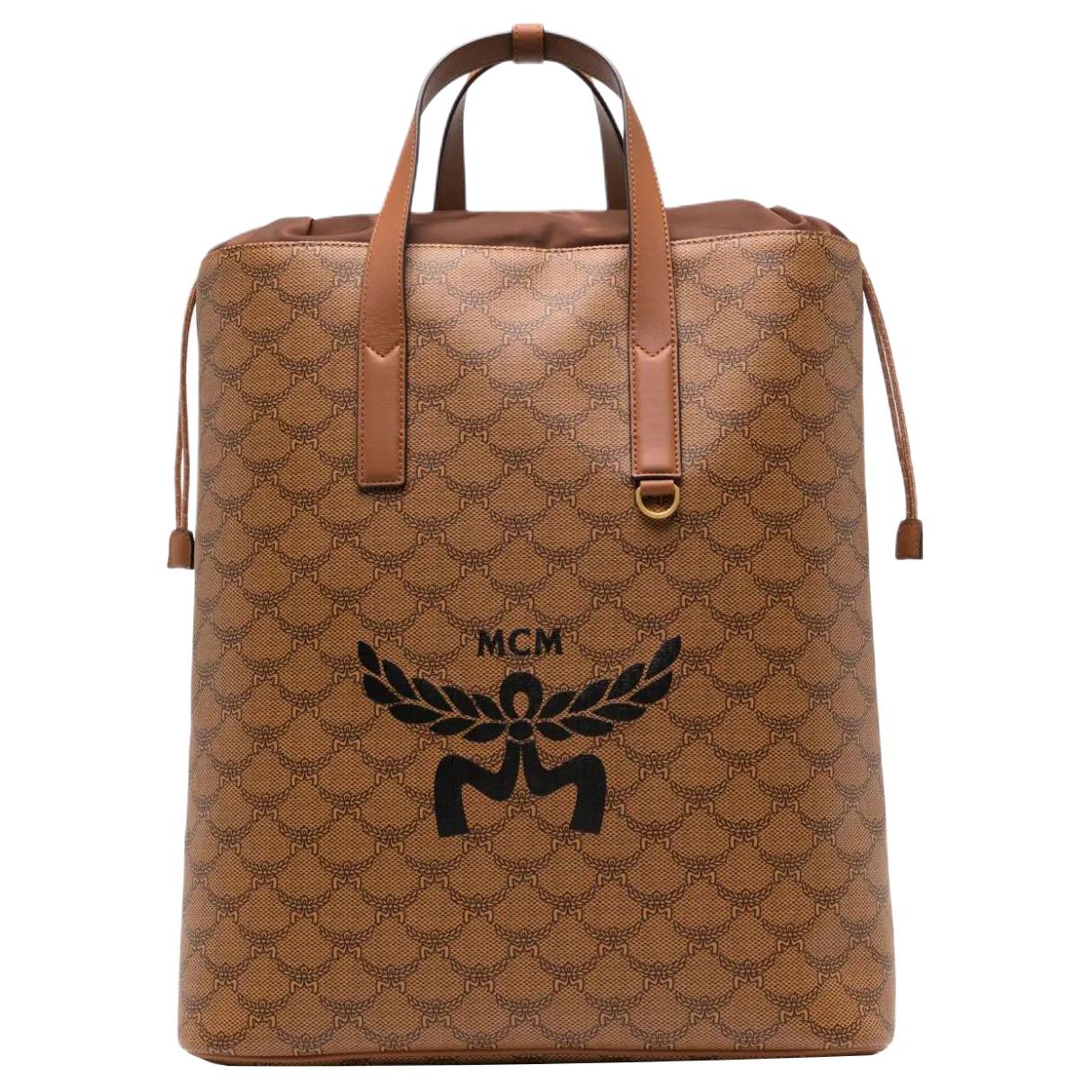 MCM Холщовый рюкзак с кожаной спинкой среднего размера мужской коньячно-коричневый и черный
MCM Холщовый рюкзак с кожаной спинкой среднего размера мужской коньячно-коричневый и черный