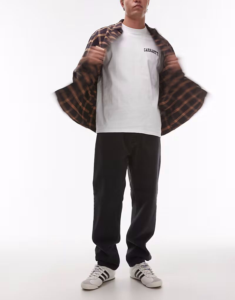 Джинсы Carhartt WIP newel свободного зауженного кроя черного цвета
Джинсы Carhartt WIP newel свободного зауженного кроя черного цвета