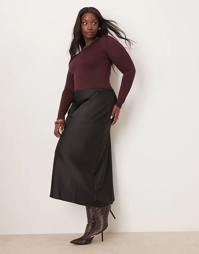 Юбка миди New Look Curve из атласа косой посадкой черного цвета
Юбка миди New Look Curve из атласа косой посадкой черного цвета