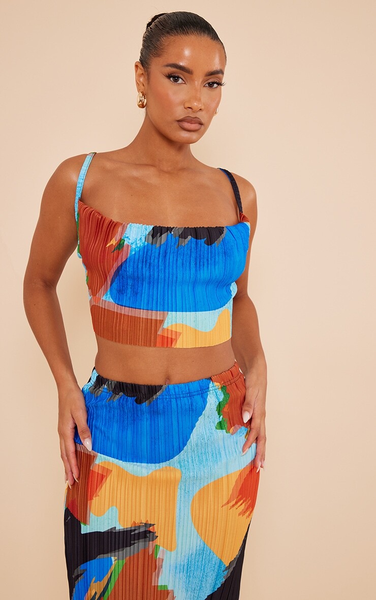 PrettyLittleThing Синий топ с плиссированным бретельками и воротником-хомутом с абстрактным принтом
PrettyLittleThing Синий топ с плиссированным бретельками и воротником-хомутом с абстрактным принтом