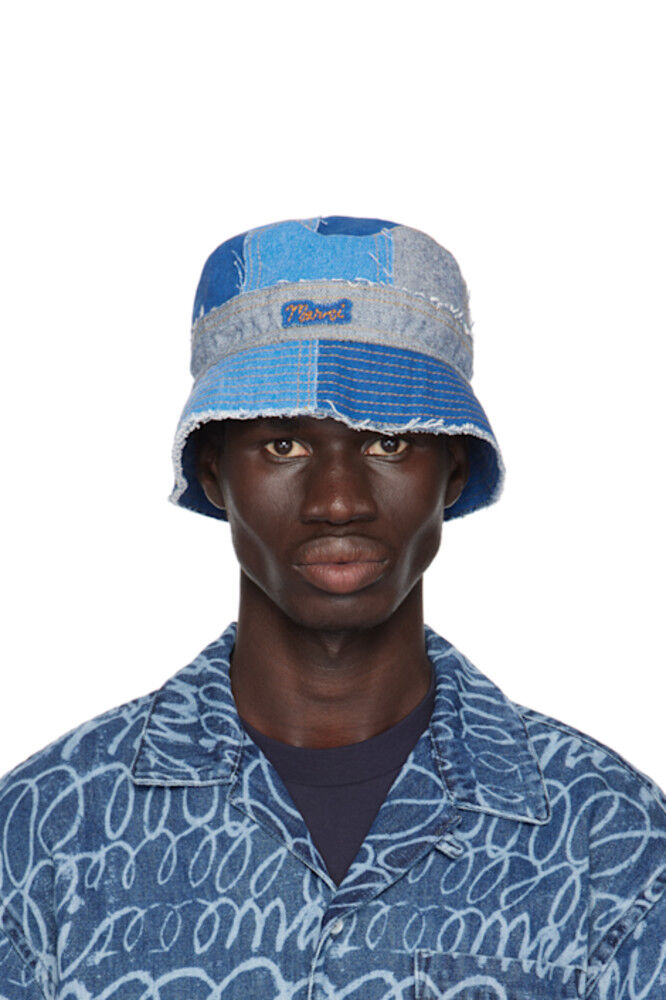 Синяя джинсовая панама в стиле пэчворк Marni
Синяя джинсовая панама в стиле пэчворк Marni