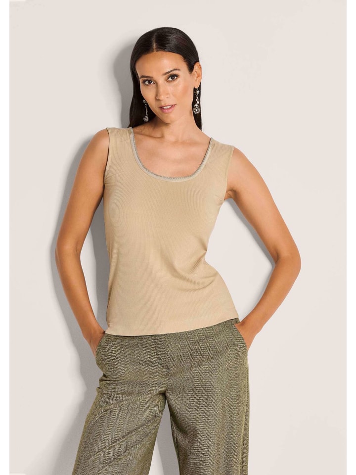 MADELEINE Удобный топ с цепочкой бежевого цвета
MADELEINE Удобный топ с цепочкой бежевого цвета