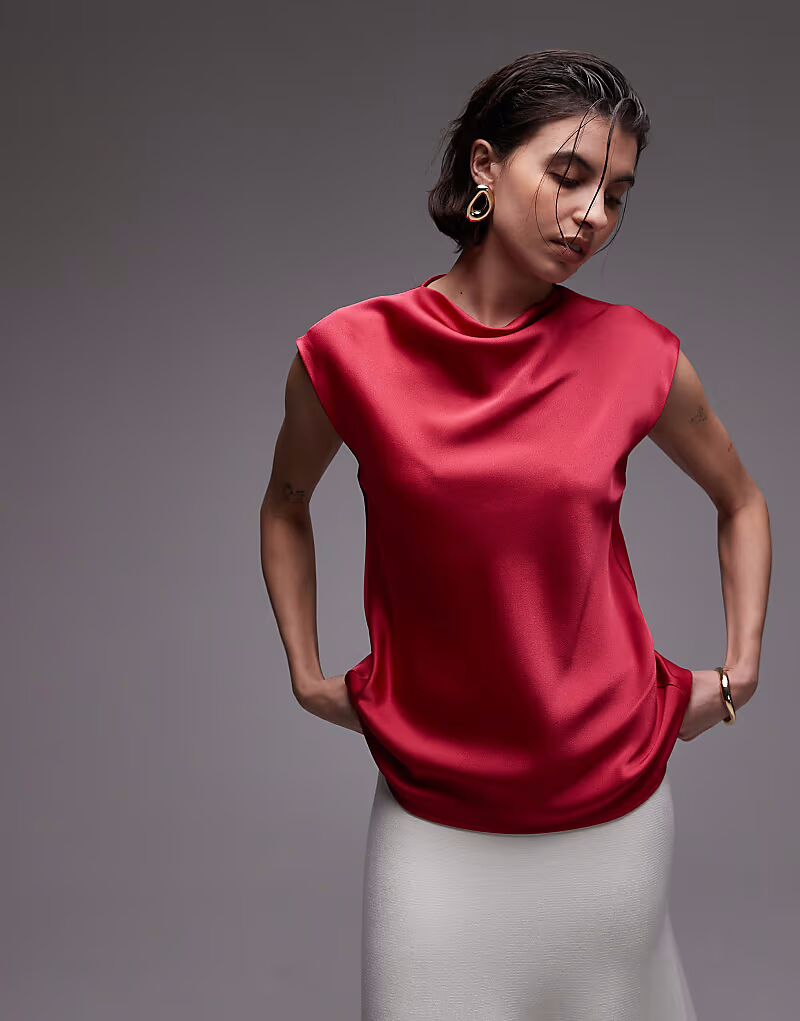 Топ из атласа цвета манго с драпировкой на воротнике и рукавами-крылышками в малиновом цвете Mango
Топ из атласа цвета манго с драпировкой на воротнике и рукавами-крылышками в малиновом цвете Mango