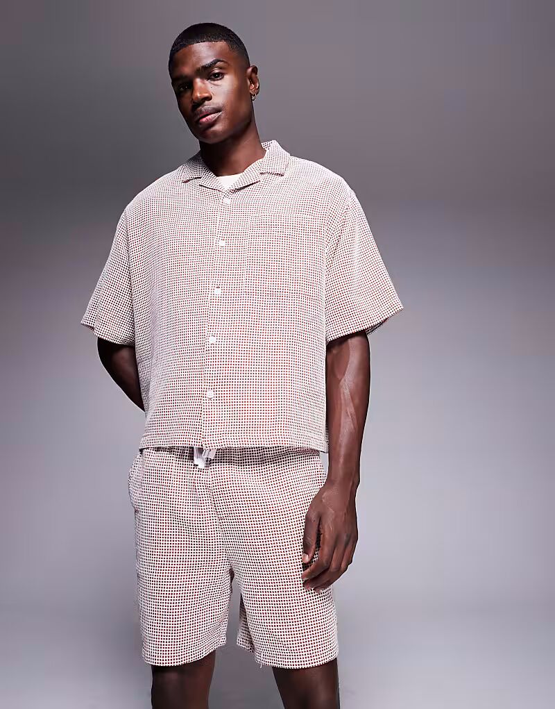 Коричневые и белые вафельные шорты средней длины Asos Design
Коричневые и белые вафельные шорты средней длины Asos Design