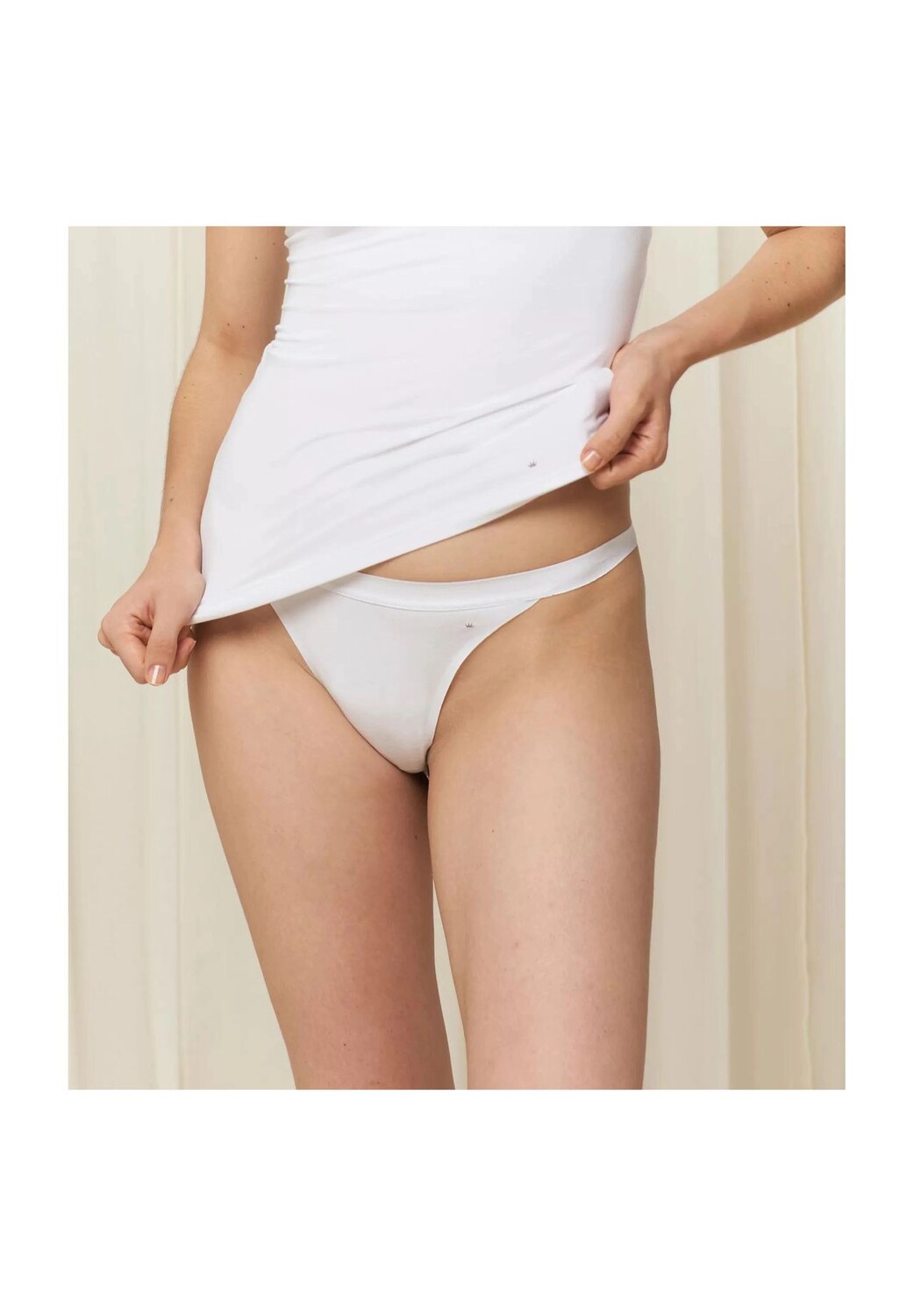 Элегантные натуральные стринги, бесшовный дизайн, для женщин Triumph, белый 
Элегантные натуральные стринги, бесшовный дизайн, для женщин Triumph, белый