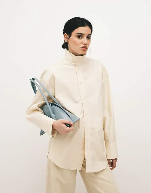 Рубашка с высоким воротником масляно-желтого цвета из 100 % хлопка Mango Capsule
Рубашка с высоким воротником масляно-желтого цвета из 100 % хлопка Mango Capsule