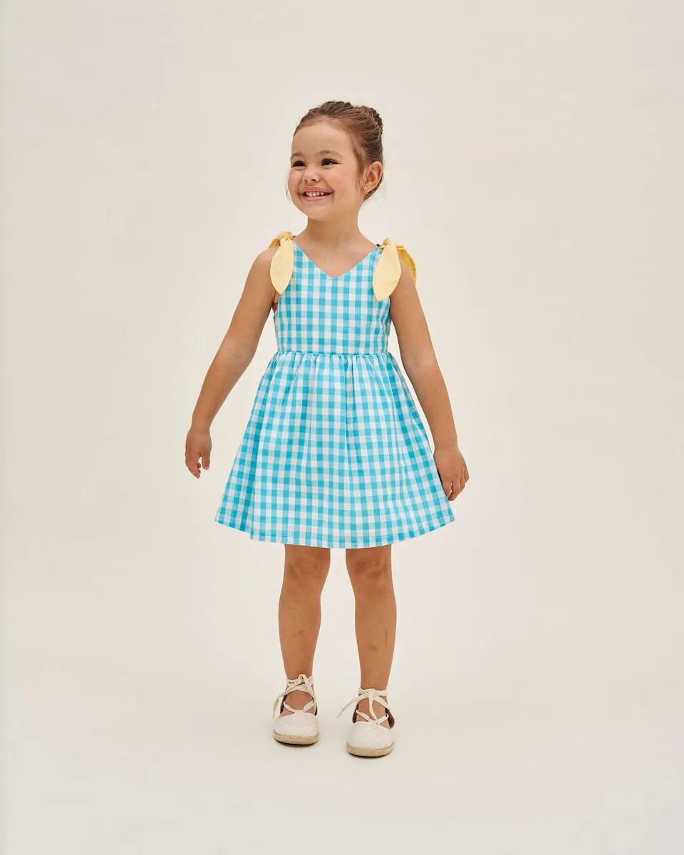 Платье для девочки в бирюзовый цвет в клетку и желтые банты Dadati
Платье для девочки в бирюзовый цвет в клетку и желтые банты Dadati