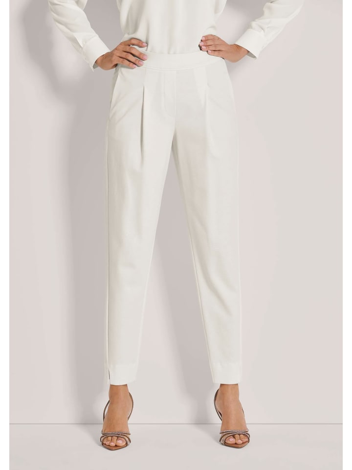 MADELEINE Плиссированные брюки-бандо кремового цвета
MADELEINE Плиссированные брюки-бандо кремового цвета