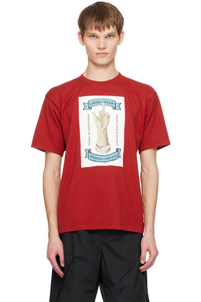 Красная футболка с рисунком UNDERCOVER
Красная футболка с рисунком UNDERCOVER