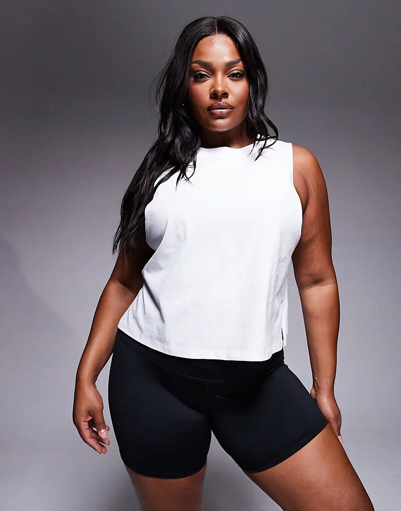 4505 Укороченный топ из хлопка с закругленными проймами и быстросохнущей отделкой белого цвета
4505 Укороченный топ из хлопка с закругленными проймами и быстросохнущей отделкой белого цвета