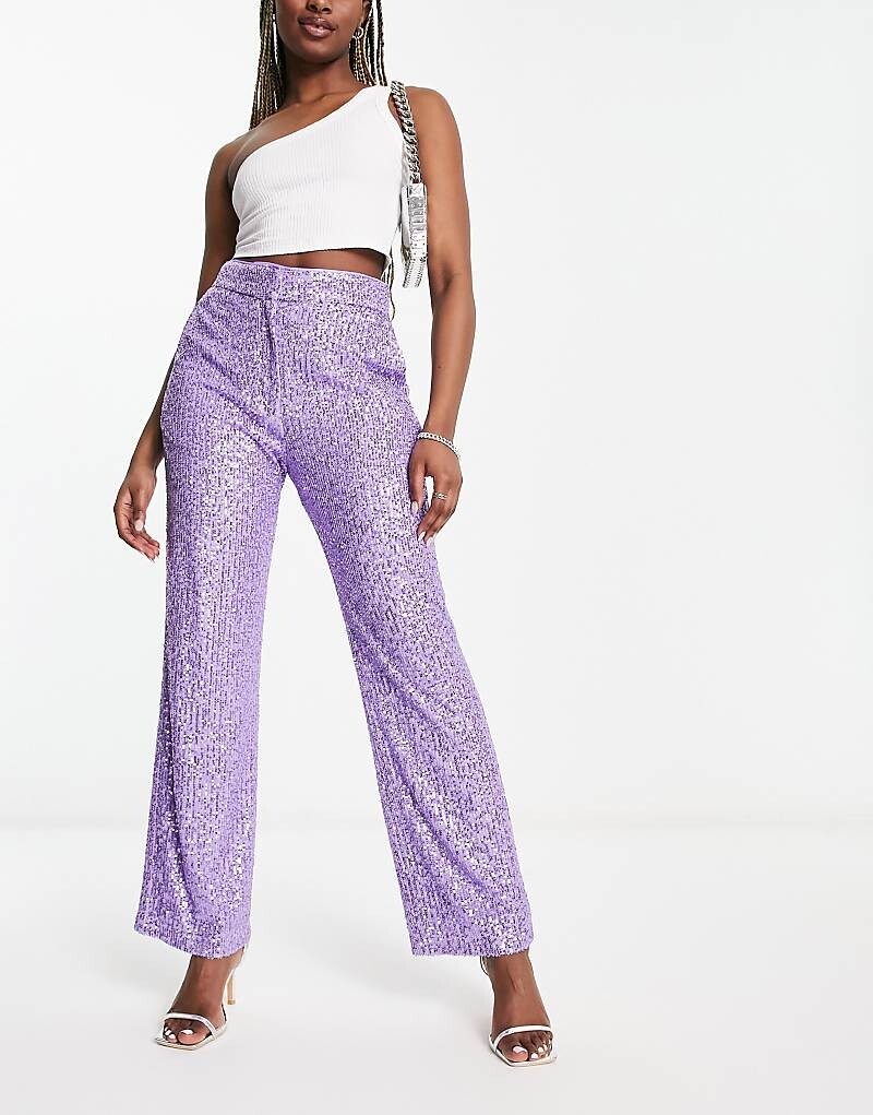 ASOS DESIGN – Фиолетовые брюки прямого кроя длиной до щиколотки с пайетками
ASOS DESIGN – Фиолетовые брюки прямого кроя длиной до щиколотки с пайетками