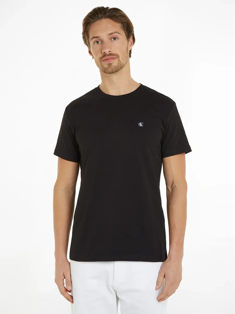 Футболка Calvin Klein Jeans "CK EMBRO BADGE TEE" с нашивкой-логотипом, цвет Ck Black
Футболка Calvin Klein Jeans "CK EMBRO BADGE TEE" с нашивкой-логотипом, цвет Ck Black