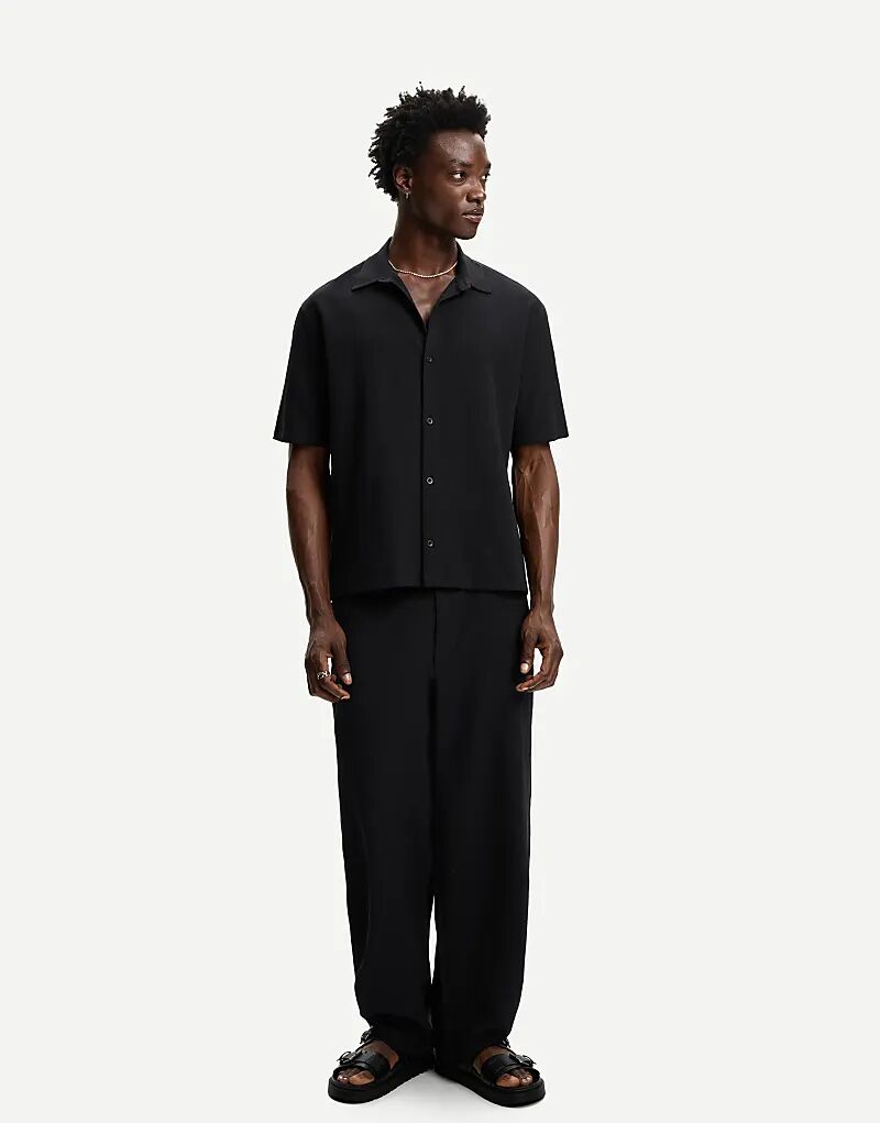 Брюки-джоггеры Bershka со складками черного цвета
Брюки-джоггеры Bershka со складками черного цвета