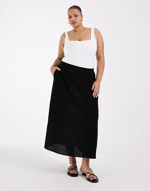 Черная льняная юбка миди Vero Moda Curve
Черная льняная юбка миди Vero Moda Curve