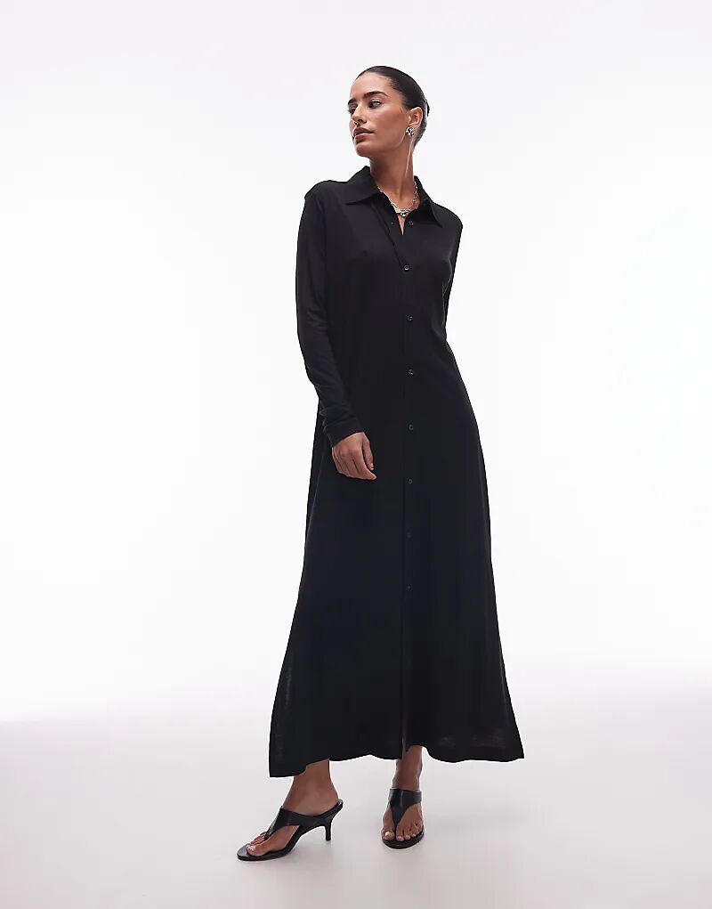 Платье-рубашка макси из джерси ARKET черного цвета
Платье-рубашка макси из джерси ARKET черного цвета