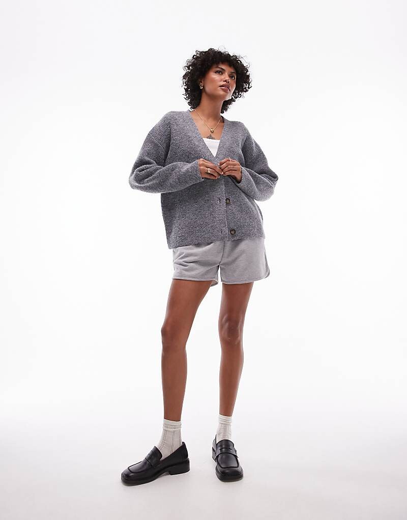 Topshop – Серый свободный кардиган в рубчик
Topshop – Серый свободный кардиган в рубчик