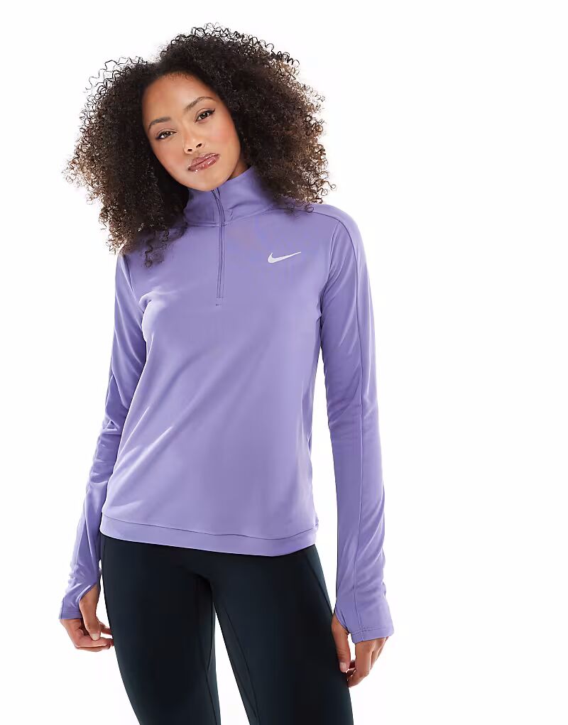 Футболка Nike Running Pacer Dri-FIT с длинными рукавами и застежкой-молнией на половину длины, сиреневого цвета
Футболка Nike Running Pacer Dri-FIT с длинными рукавами и застежкой-молнией на половину длины, сиреневого цвета